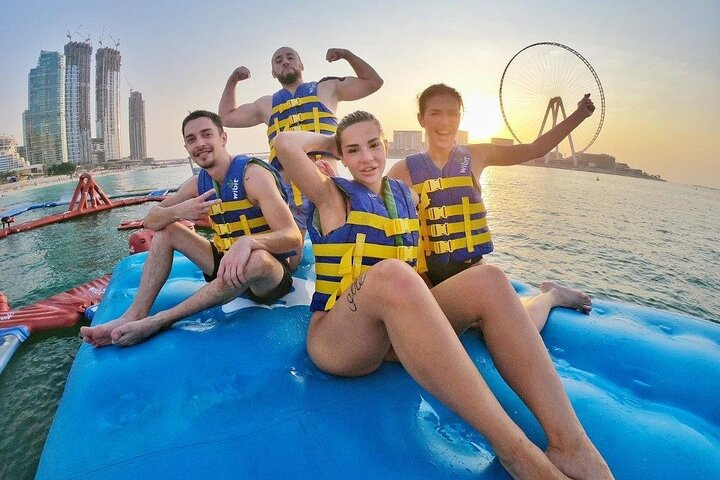 Experience the world’s largest inflatable water park at Aqua Fun Dubai where friends and family enjoy exciting challenges amidst stunning views of JBR Beach and Dubai’s skyline.